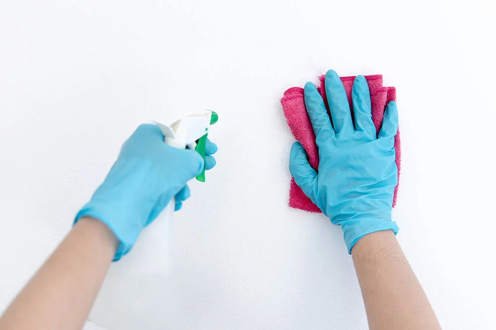 cleaning white walls